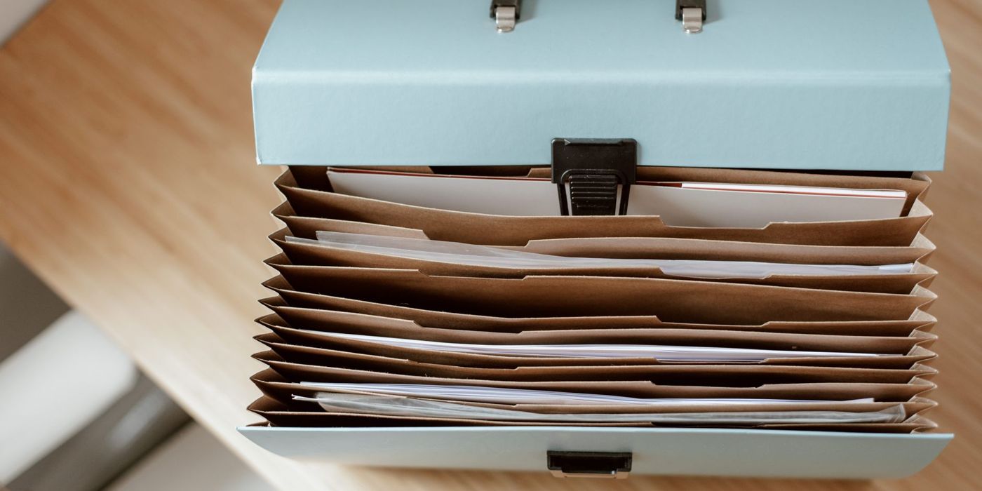 Two document folders on a desk