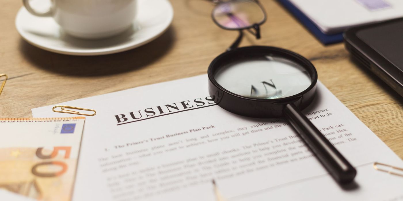 A magnifying glass over documents