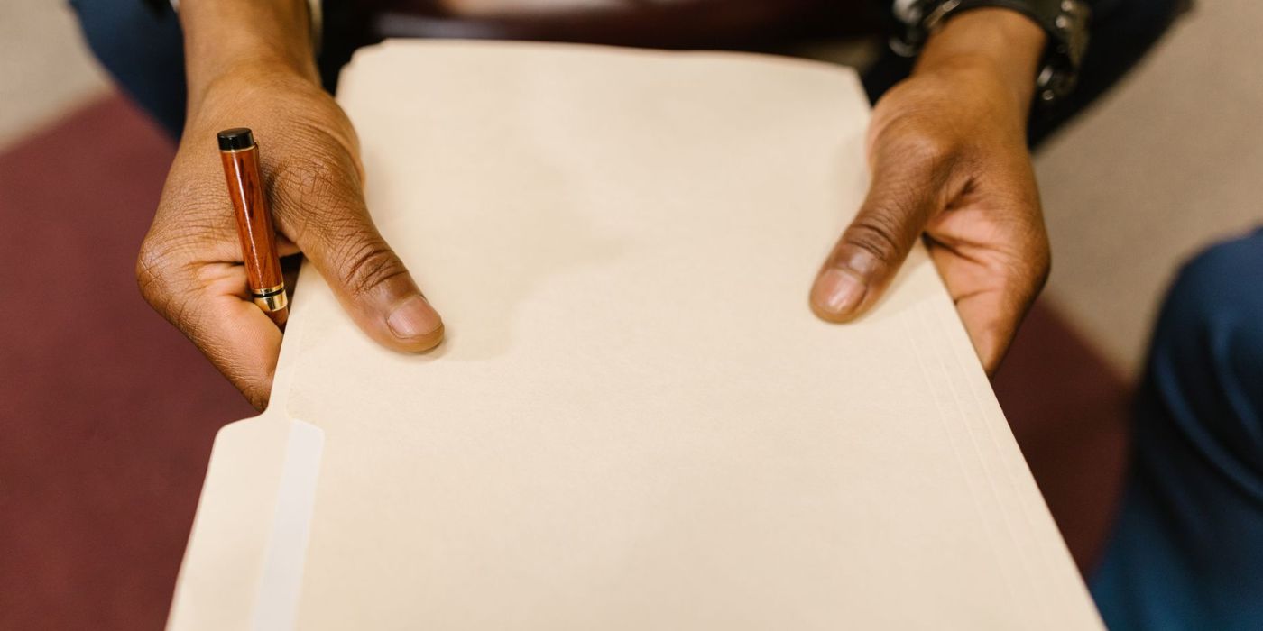 Legal documents and a pen on a desk