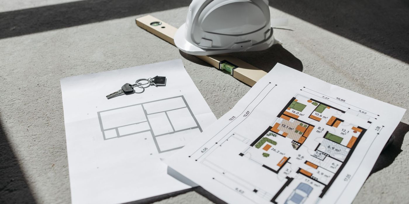 House construction with blueprints